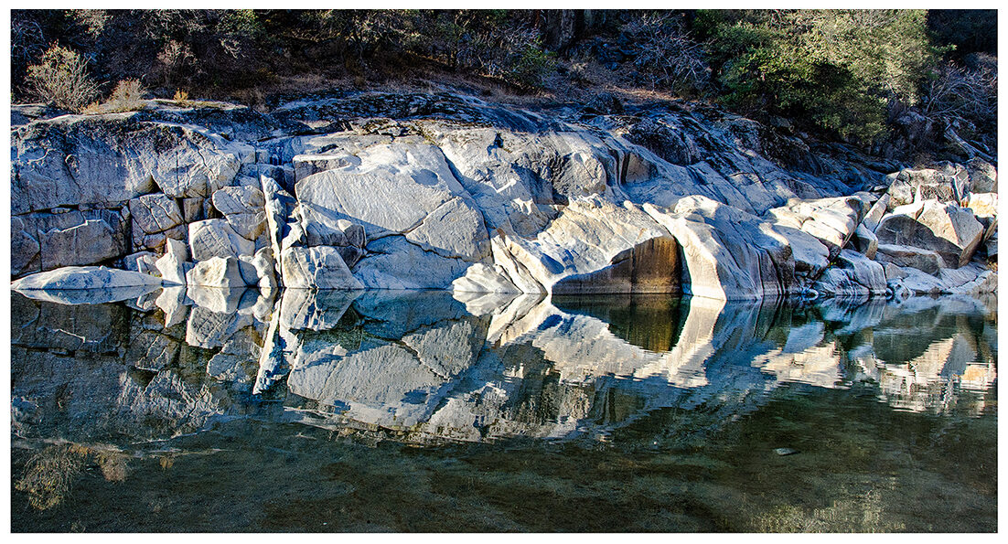 Rocks reflected in the water of the Yuba River