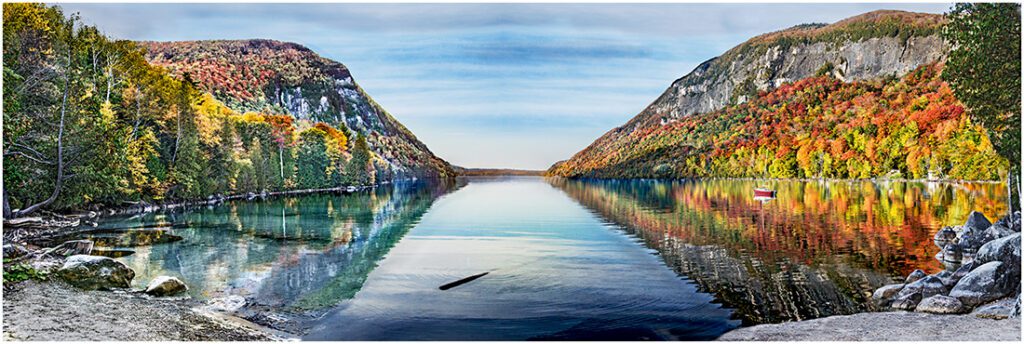 Lake Willoughby surrounded  by color aspen.